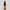 Amber dropper bottle of 'Bronzing Face Serum with Sea Buckthorn Oil' on a light gray background 
