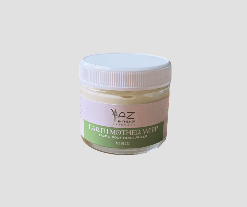 Jar of 'Earth Mother Whip' face and body moisturizer on a light gray background