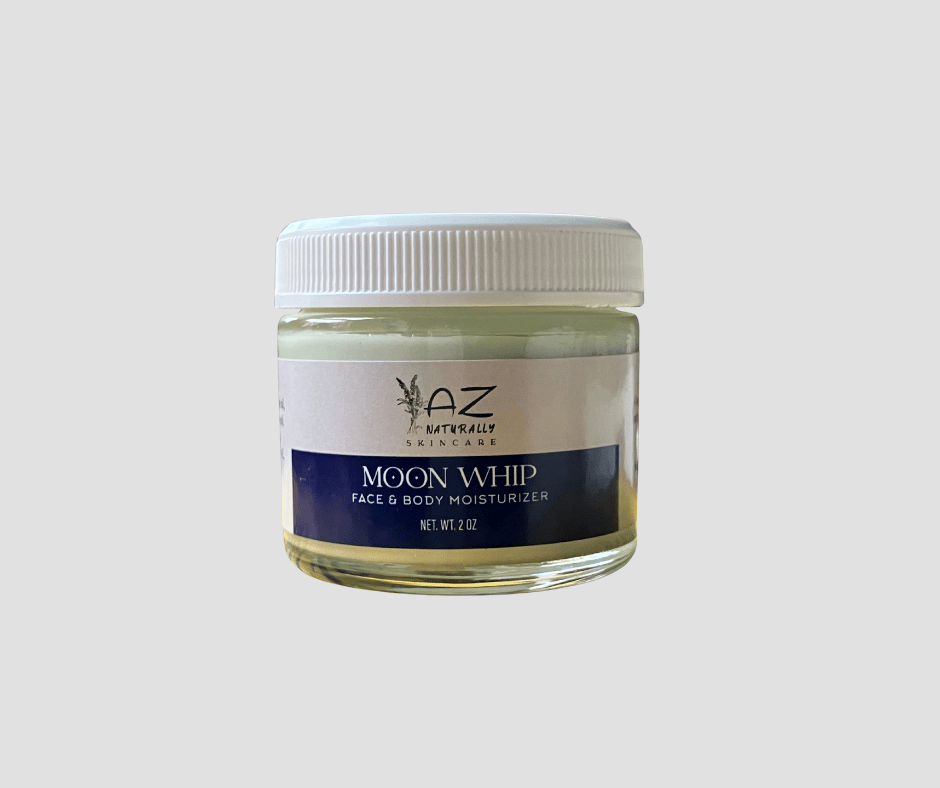 Jar of 'Moon Whip' face and body moisturizer on a light gray background