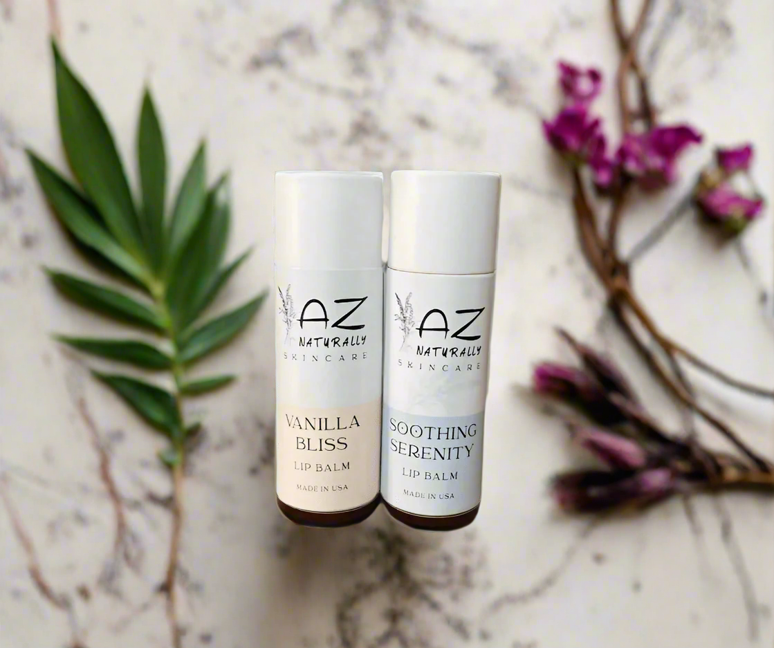 Two bottles of 'Tallow-based Lip Balm' labeled 'Soothing Serenity' and 'Vanilla Bliss' on a light gray background